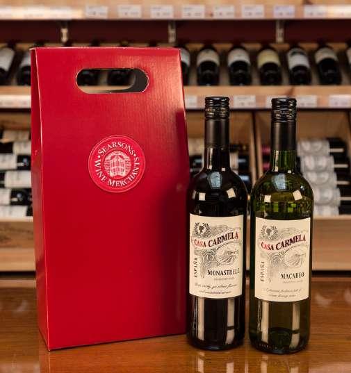 Wine Gifts Presented in our signature seasonal red gift boxes.