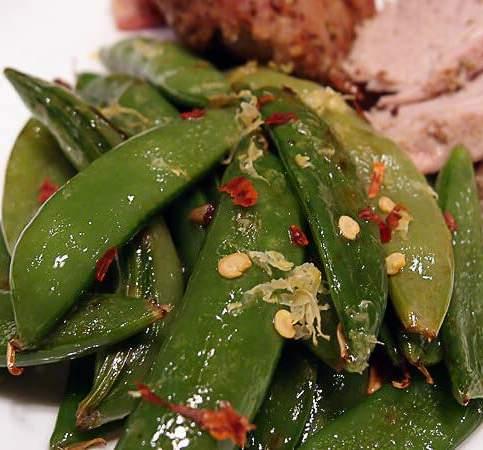 Bacon Infused Sugar Snap Peas INGREDIENTS 3 Cups Sugar Snap Peas (~200g) 1/2 Lemon Juice 3 Tbsp. Bacon Fat 2 tsp. Garlic 1/2 tsp. Red Pepper Flakes INSTRUCTIONS 1. Add 3 Tbsp.