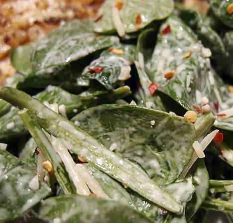 Red Pepper Spinach Salad INGREDIENTS 3 Cups Spinach 2 Tbsp. Ranch Dressing 1 1/2 Tbsp. Parmesan Cheese 1/2 tsp. Red Pepper Flakes INSTRUCTIONS 1. Add spinach to a mixing bowl, then drench in ranch. 2. Mix everything together and add your parmesan and red pepper flakes.