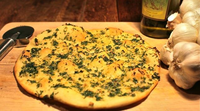 Garlic Bread Here at Caffé di Pasta, our garlic bread is created only with fresh garlic from our garden outside our