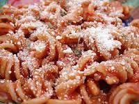 Rotini Our rotini is topped with tomato or meat sauce, and is served with two or more sides.