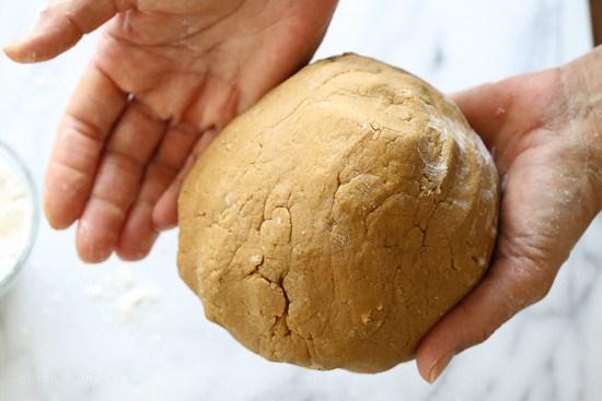 Place flour on your hands so the dough doesn t stick to you, then divide the dough into two flat balls; cover with plastic wrap and chill in the refrigerator for at least 2 hours. 4.