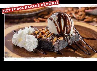 69 Walnut-covered chocolate brownie soaked with Kahlúa liqueur, served with vanilla ice