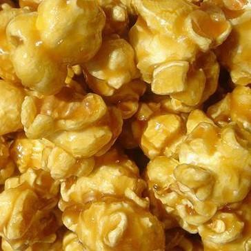 Classic Caramel Corn 2 bags microwave popcorn 1 stick unsalted butter 1 cup light brown sugar ¼ cup light corn syrup 1 tsp. baking soda 1.