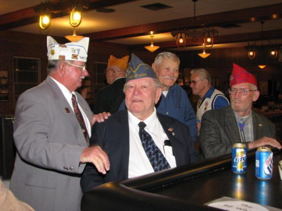 His reminiscence about past Veterans Days made a big hit with the Voyageurs and