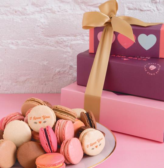 HAPPY VALENTINE S DAY MINI MACARONS STACK Box of 3 Macarons Rose, Vanilla & Salted Caramel printed with a sweet I Love You message Box of 9 Macarons Assortment of Strawberry Passion Fruit, Dark