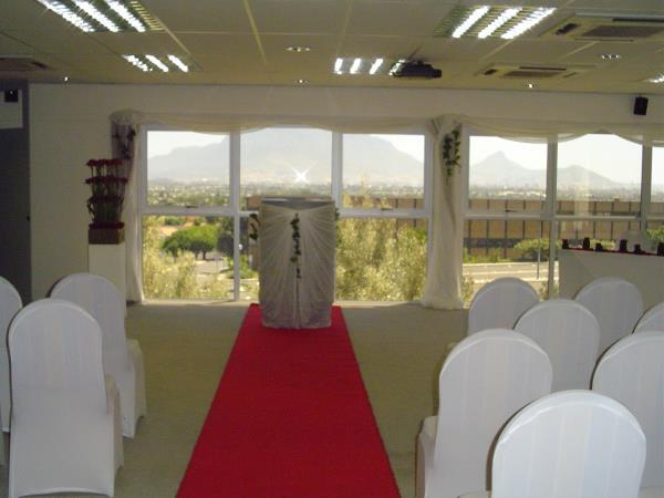 Ceremony venue will include chair, white chair covers, red carpet, podium, register table, lapel microphone and CD player for background music. All other décor will need to be supplied by the client.