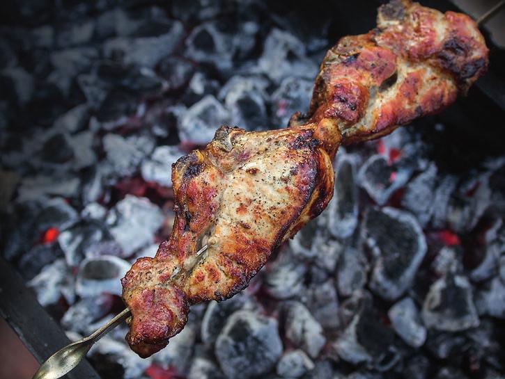 Shashlik, the dish that became famous during Soviet times, is usually cooked on the stick small pieces of marinated meat cooked on the coals.