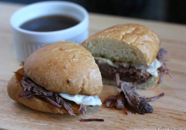 Tuesday Slow Cooker French Dip Sandwiches 1 2.5-3 lb. beef chuck roast 2 Tbsp. olive oil salt and pepper 2 1-ounce packages dry onion soup mix 2 c.