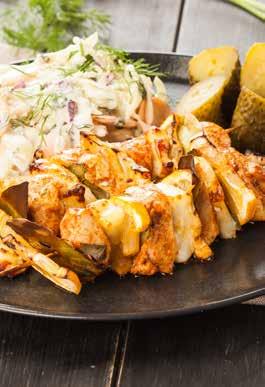 MAIN DISHES CHICKEN CURRY Chicken drumstick slices over smoked eggplant salad, served with curry sauce and toasted