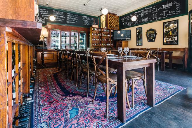 High tables and chairs offer a convivial ambience among the wider pub