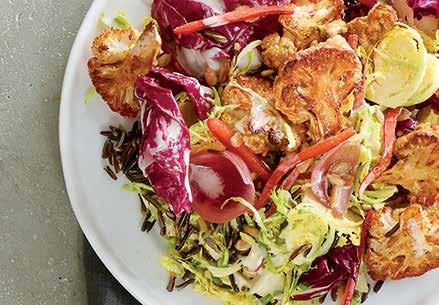 SPICE ROASTED CAULIFLOWER SALAD Roasted cauliflower is spiced with cumin and smoked paprika, tossed with Brussels sprouts, radicchio and roasted red peppers, then tossed in Sesame Honey Dressing.