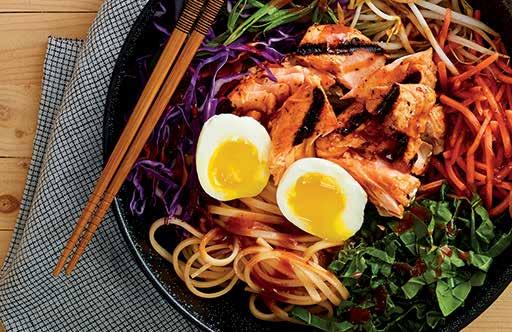 KOREAN NOODLE SALAD WITH SPICY GRILLED SALMON A crunchy, colorful salad gets a kick from spicy gochujang dressing. Topped with grilled salmon and a soft-boiled egg for a perfect meal bowl.