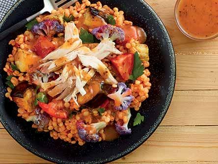 AFRICAN GRAIN SALAD Israeli couscous, barley and flat leaf parsley combined with harissa and topped with diced roasted eggplant, tomato and purple cauliflower.