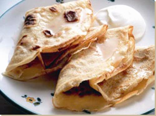 Bliný are a fancy variation of pancakes. These round, flat dough-cakes with different fillings inside are folded and served warm, often with toppings.