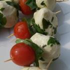 Caprese Appetizer Rated: Submitted By: Jessi Pht By: CNM CATERING Prep Time: 15 Minutes Ready In: 15 Minutes Servings: 10 "Yur guests will lve these bite-sized skewers f mzzarella cheese, fresh