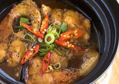 FISH - CÁ Caramelized Fish Pot Cá Kho Tộ Fish cooked in a traditional caramelised sauce with ground black pepper, cooked and served