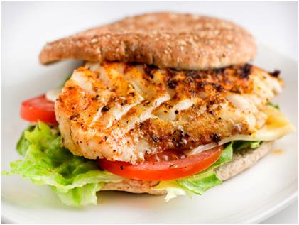 FISH SANDWICH 1 cup lettuce 2 slices Ezekiel sprouted grain bread 8 oz grilled grouper 1 sliced tomato 398 Protein 58g Carbohydrates 32g Fats 4g Place grouper in hot