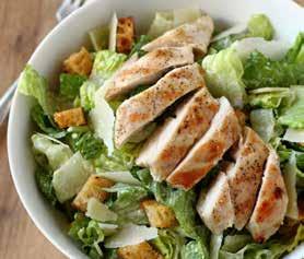 99 Chicken Caesar Salad Crisp hearts of romaine, croutons, parmesan cheese and creamy caesar dressing topped with fire-grilled chicken breast. 9.