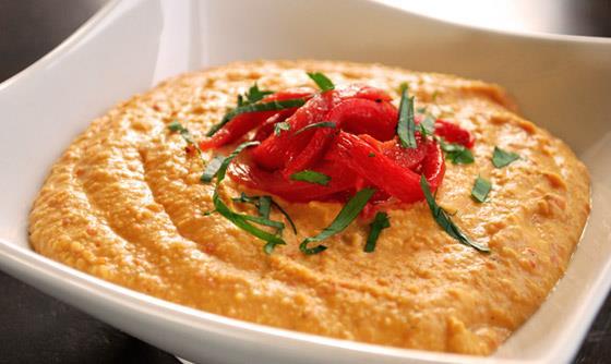 Roasted Red Pepper Hummus 1 can chickpeas, rinsed and drained ½ red pepper, chopped and roasted 3-5 cloves of garlic 2 tbsp tahini paste* 2 tbsp lemon juice 2 tbsp olive oil 1 tbsp water** Salt and