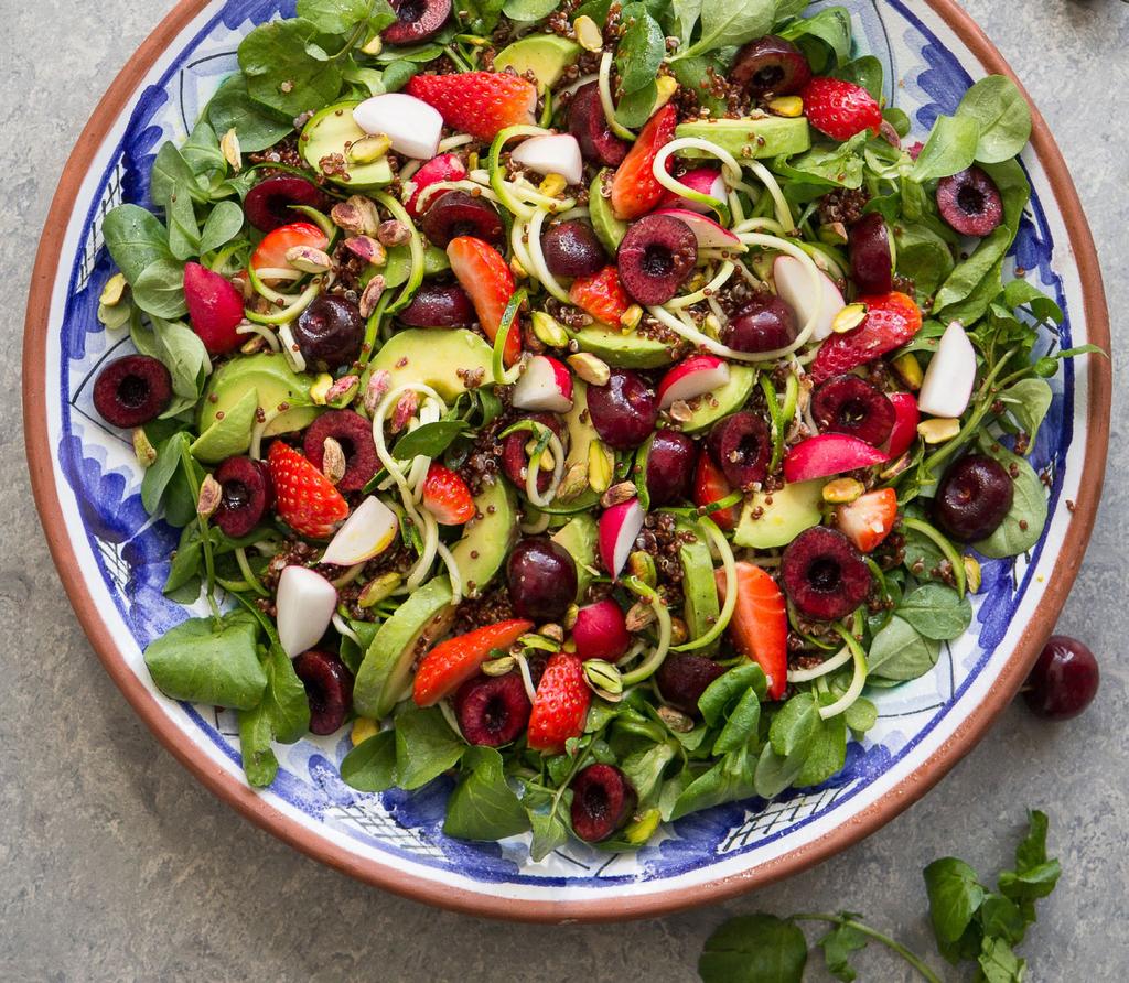 Dark cherry and strawberry quinoa salad The cherries are striking in this nourishing salad with quinoa, avocados and pistachios with strawberries.