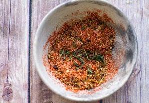 Make the tomato cauliflower rice. Preheat a large frying pan over medium-high.