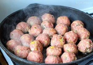Scoop heaped tablespoonfuls of meat mixture and roll into balls.