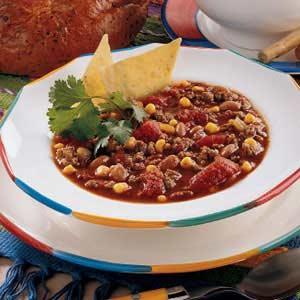 Taco Soup Ingredients 2 pounds ground beef 2 cups diced onions 2 (15 1/2-ounce) cans pinto beans 1 (15 1/2-ounce) can pink kidney beans 1 (15 1/4-ounce) can whole kernel corn, drained 1 (14