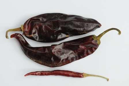of the surface of the produce; Interpretation: whole dried chilli peppers showing blemishes, discoloration and/or pronounced staining that do not exceed the 25 % of the fruit surface are allowed in