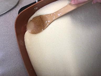 Pour into pot. Pour 1 gallon of milk into pot and stir vigorously. Heat milk to 90 F while stirring. Once the desired temperature is reached, remove pot from burner.
