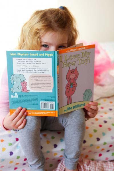 How to Get Your Kids Reading Nurture your pint-sized bookworms with some fun ways to encourage kids reading at home Tags: Reading, Back to School By Hilda Stevens KATANDLARAPHOTOGRAPHY.