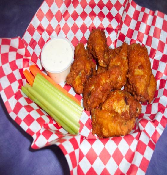 Wings WINGS Breaded Bone In Hot or Regular One pound.$ 15.75 1/2 poundsnacker.$ 8.75 1/4 pound Sampler $ 6.50 Meaty wings served with Ranch or Bleu Cheese dressing, carrots & celery sticks.