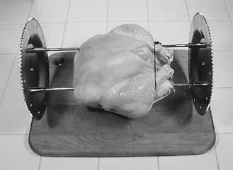 Piercing Poultry with Rods Hold the tied poultry or meat down securely with one hand while firmly pushing the Spit Rods into the bird,