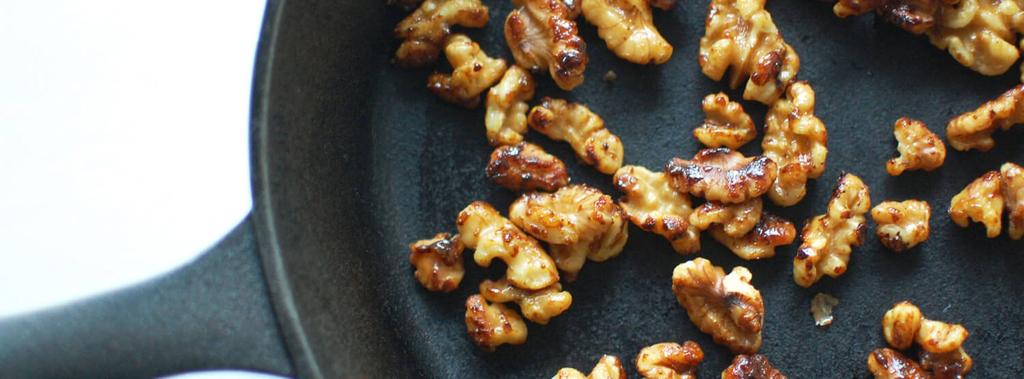 Spiced Walnuts 6 ingredients 10 minutes 4 servings 1. Lay a large piece of wax paper across the counter. 2. Heat a large skillet over medium heat. Add honey, oil and 1 tbsp water.