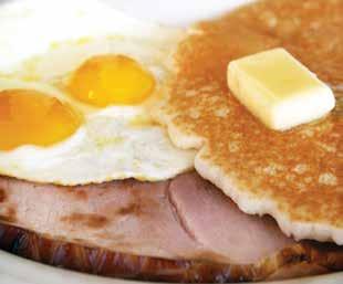 79 French Toast Breakfast Our thick sliced toast is dipped in our secret-formula blend and grilled to golden perfection. Served with two eggs and your choice of ham, sausage or thick sliced bacon 8.