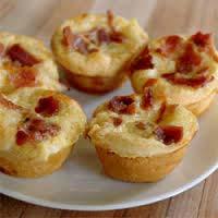 MINI QUICHES Ingredients: Ready made puff pastry 1 small onion (fried) 40g cheddar cheese (grated) 25g ham (chopped) 75ml milk 1 egg Salt and pepper Method: 1. Turn oven on to 180 C 2.