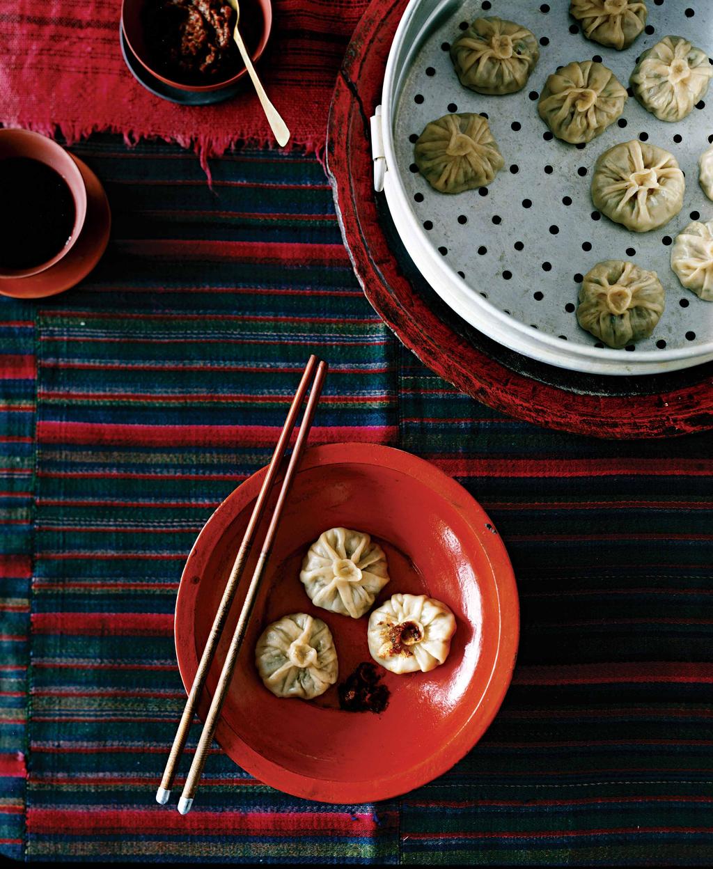NEPAL momos MOMOS In the Himalayas, fluted purses of steamed dough are a cornerstone of almost every meal.