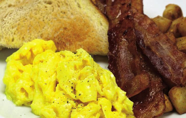 with a meal selection $2 / guest / item HOT BREAKFAST TABLE Cage free scrambled eggs Choice of sausage or bacon Crispy breakfast potatoes Danishes Assortment of muffins Assorted whole fruit Dannon