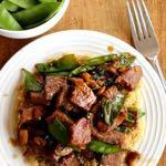 DAY 2 ASIAN BEEF AND SNOW PEAS M A I N D I S H Serves: 4 Prep Time: 10 Minutes Cook Time: 10 Minutes Calories: 403 Fat: 7.9 Carbohydrates: 40.7 Protein: 39.4 Fiber: 2.1 Saturated Fat: 2.