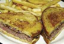 6.25 Dlx. 9.50 Veggie Burger Reg. 6.50 Dlx. 9.75 Burger Extras Crisp Bacon 1.95 Tomato.65 Fried Onions.50 Mushrooms.95 Choice of Cheese (American, Swiss, Cheddar or Mozzarella) 1.15 Bleu Cheese 1.