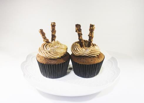 Banana Cupcake $18 Made with fresh banana, frosted with