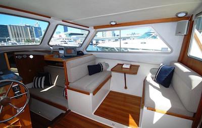 Specifications 32 foot Cruiser Accommodates up to 12 passengers Lounge seating