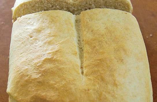 Tackiness in producing yeast dough can create problems in production and the addition of dehydrated potato lakes to absorb extra moisture aids and allows for easy loaf formation and portioning.