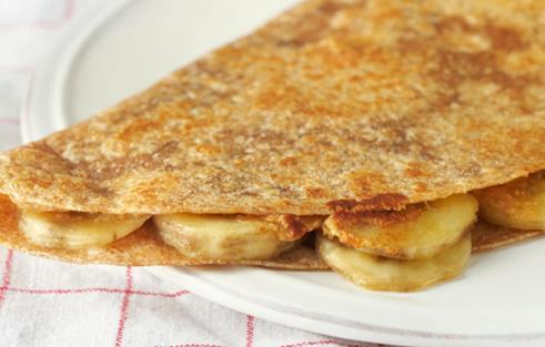 Peanut Butter and Banana Pockets Number of Servings: 4 Serving Size: 1 folded quesadilla 3 ripe bananas 3 tablespoons creamy peanut butter 1½ teaspoons honey ¼ teaspoon ground cinnamon 4 (8-inch)