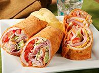 Cucumber Turkey Roll- Ups Number of Servings: 5 Serving Size: 1 Roll-up 5 whole wheat tortillas 8-inch 1 tablespoon mustard 1/2 pound cooked turkey breast, sliced 1 tomato, diced (about one cup) 1