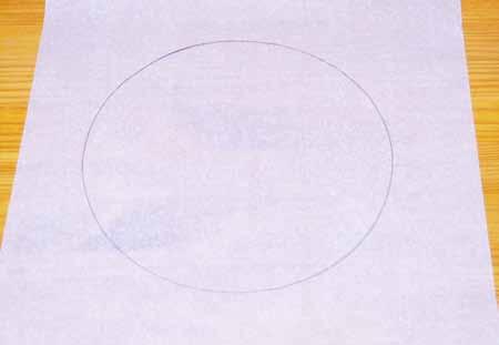 8 To assist me when shaping my pie crust, I drew a circle on a piece of parchment paper. The circle is slightly larger than my pie plate.