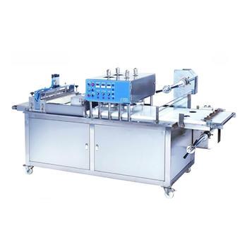 balls between the top and bottom films, then pneumatic pressing plates will press them into about thin pastries, then cut and film. The machine is easy to assemble, clean and maintain.