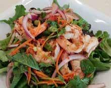 SHRIMP SALAD 15 Tossed with lemongrass, mint leaves, kaffir lime leaves, roasted curry paste, spicy citrus lime dressing and served on a blend of organic spring mix.