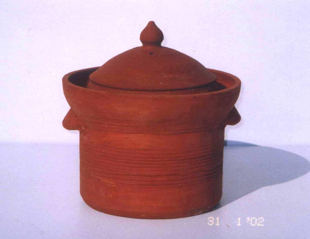 Features : In this design the pot is coated with terracotta colour (kabiz) to increase its durability. It has a lid, which cover the top of storage space.