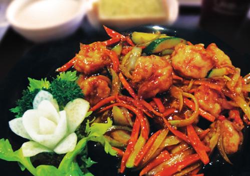 95 Jumbo shrimps and scallops stir-fried with mixed vegetables in our tasty white wine